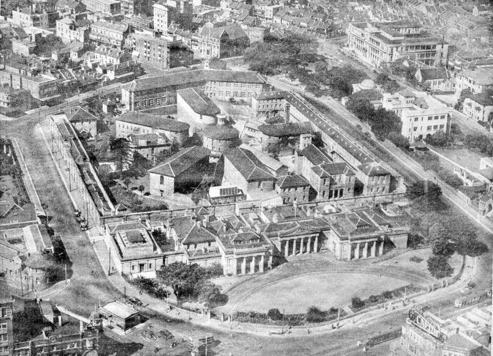 Darlinghurst gaol and courthouse, in foreground, complex, c. 1930. 