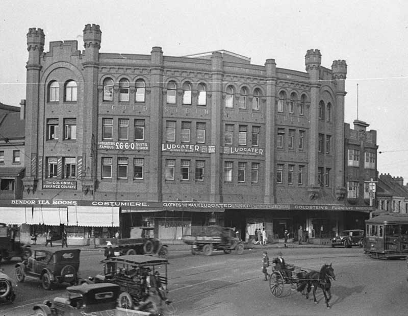 138 Liverpool Street, (corner Elizabeth Street), Sydney, showing Bendor Tea Rooms (A.M. Bend), Colonial Finance Company, Herbert Ludgater Clothes store, Goldstein’s Furniture Warehouse, c. 1926. Image: NSW State Library collection. Reproduction: Peter de Waal 138 Liverpool Street, (corner Elizabeth Street), Sydney, showing Bendor Tea Rooms (A.M. Bend), Colonial Finance Company, Herbert Ludgater Clothes store, Goldstein’s Furniture Warehouse, c. 1926. Image: NSW State Library collection. Reproduction: Peter de Waal
